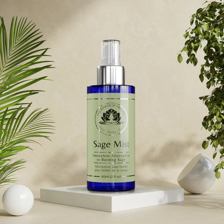 Sage Mist bottle on a white platform with plants in the background