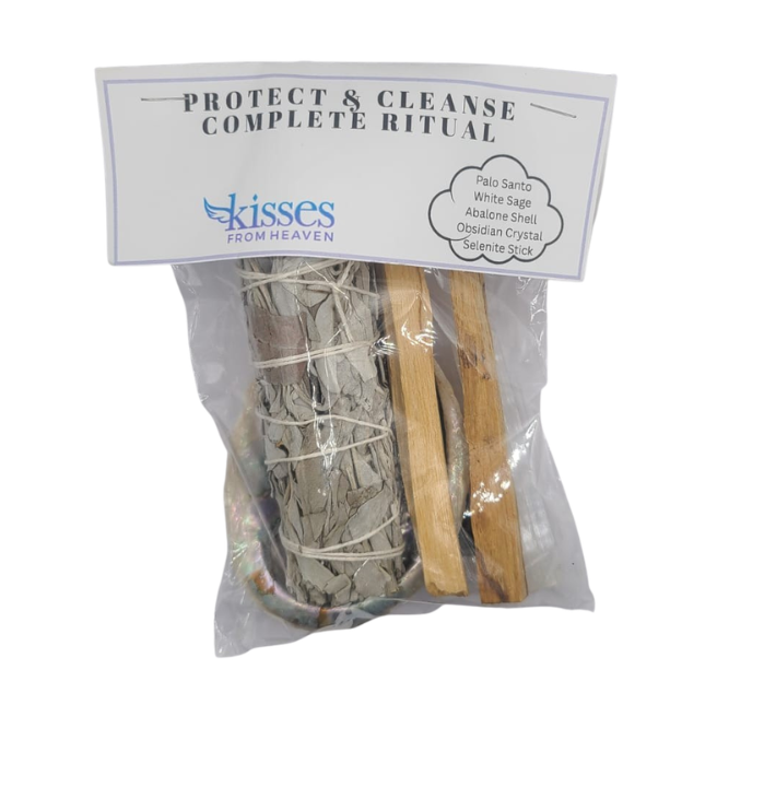 Packaged ritual kit with Palo Santo, White Sage, Abalone Shell, Obsidian Crystal, and Seaweed Stick, branded 'Kisses from Heaven'.